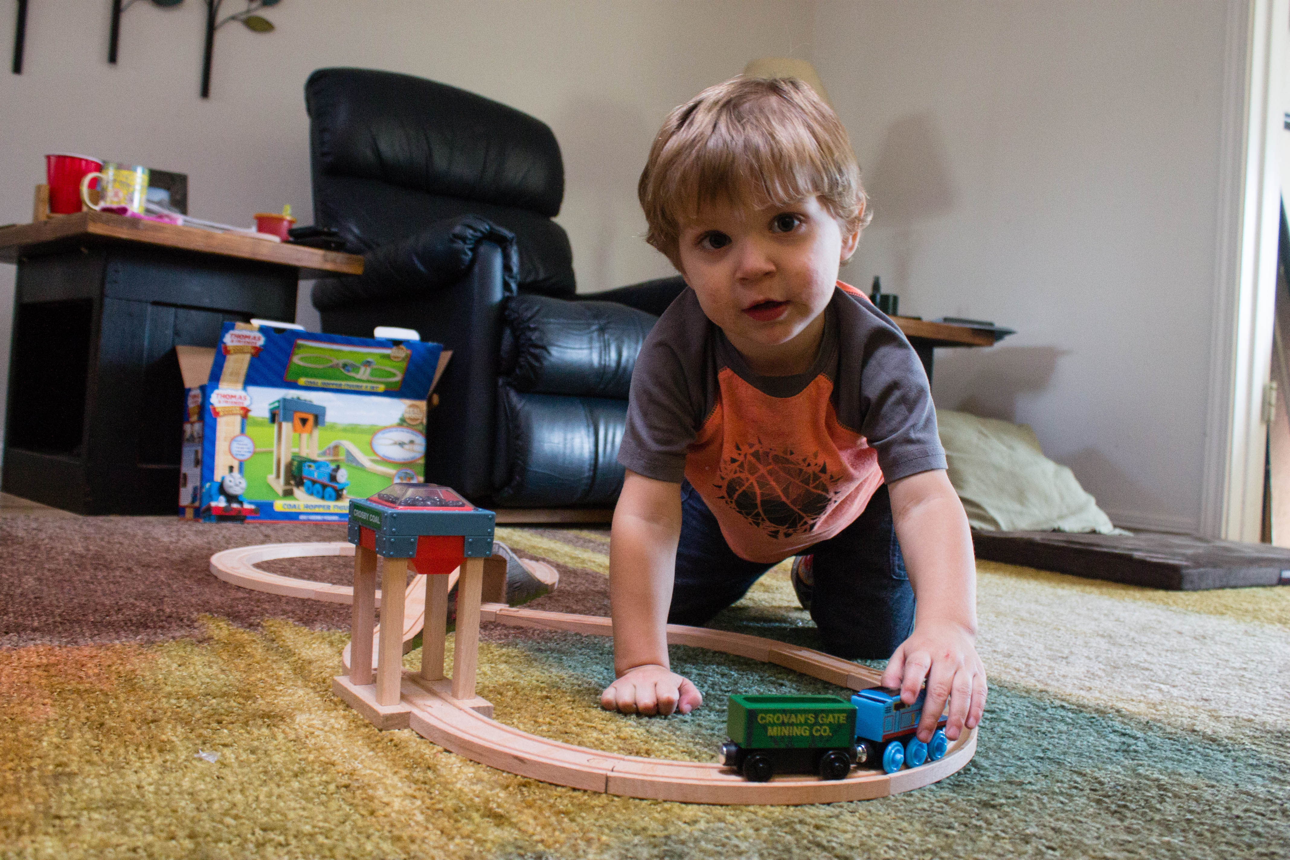2-year-old Johnny and his Thomas the Train set at Christmas